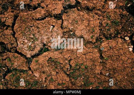 abstract of red clay soil, copper oxide contained rock in deep red