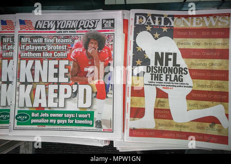 The New York Daily News and New York Post newspapers on Thursday, May 24, 2018 report on the NFL ruling that players must stand during the national anthem but are allowed to remain in the locker room if they do not wish to participate. The ruling is a compromise over some players 'taking a knee' during the anthem as a protest against racism and police brutality. (Â© Richard B. Levine) Stock Photo