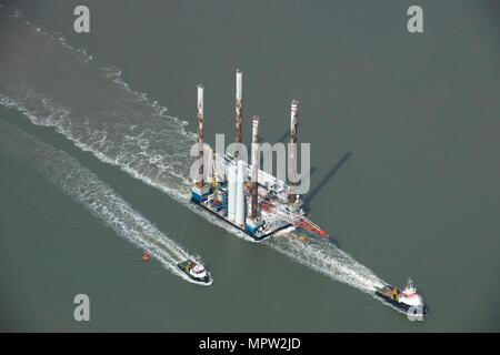 Wind farm construction vessel en route to a construction site, Harwich Harbour, Suffolk, c2010s(?). Artist: Damian Grady. Stock Photo