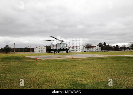 Soldiers with Company C, 1st Battalion, 168th Aviation (Medevac) of the Wisconsin National Guard at West Bend operate a Blackhawk helicopter April 11, 2017, at Fort McCoy, Wis. The helicopter and crew were at the installation to support an official visit by Brenda L. McCullough, director of Installation Management Command-Readiness at Fort Bragg, N.C. Crew members aboard the helicopter included Maj. Marcea Weiss, Capt. Casey Voss, and 1st Sgt. Patrick Deuberry. Stock Photo