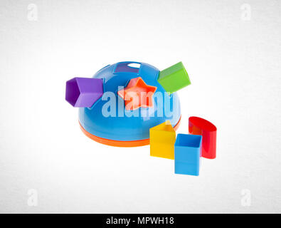 Shape Sorter or Childs toy shape sorter on a background Stock Photo