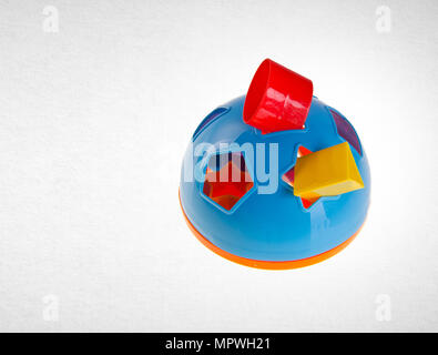 Shape Sorter or Childs toy shape sorter on a background Stock Photo
