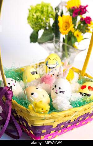 Basket of Hand Decorated Easter Eggs and Bunnies, USA Stock Photo