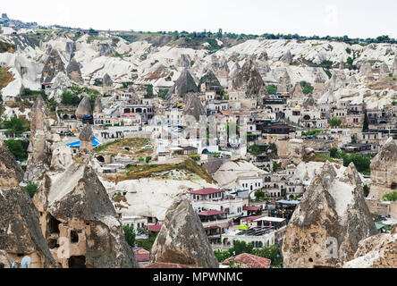 Goreme town with modern and ancient houses Stock Photo - Alamy