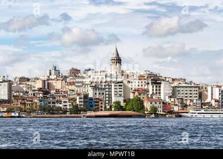 Travel to Turkey - view of Galata (Karakoy) Quarter over Golden Horn bay in Istanbul city in spring Stock Photo