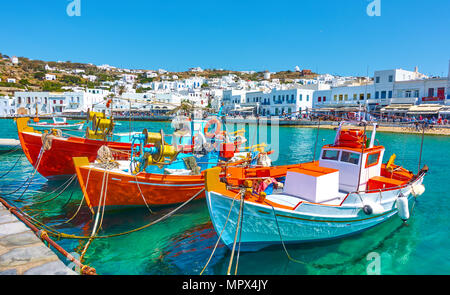 Port with old fishing boats and the waterfront in Mykonos Islang, Greece Stock Photo
