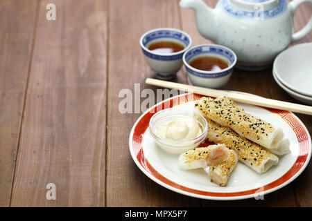 sesame wafer prawn rolls, chinese dim sum Stock Photo