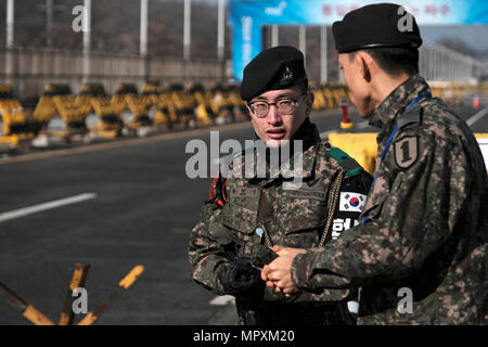 South Korean Military policemen standing  at a checkpoint at the Civilian Control Line, located outside of the DMZ The Korean Demilitarized Zone established by the provisions of the Korean Armistice Agreement to serve as a buffer zone between the Democratic People's Republic of Korea (North Korea) and the Republic of Korea (South Korea) Stock Photo