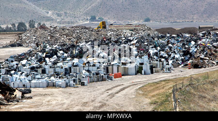 Recycling scrap metals, including discarded appliances such as refrigerators, diswashers, freezers,  stoves & etc. Stock Photo