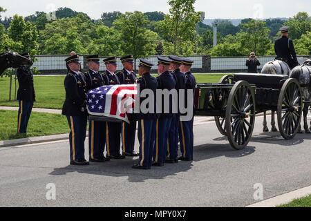 Casket off-loaded for carriage to Grave During Military Funeral at Arlington National Cemetery Stock Photo