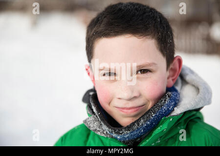 Portrait of confident teenage boy wearing warm clothing during winter Stock Photo