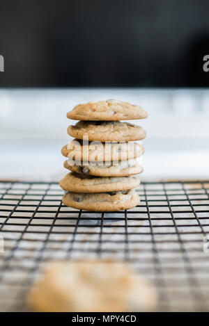Stack of cookies on cooling rack Stock Photo
