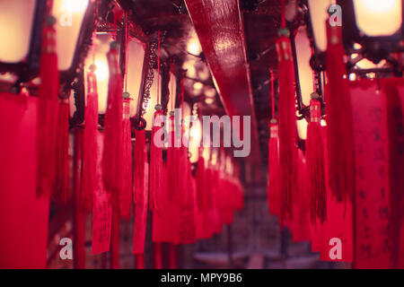 Illuminated red Chinese Lanterns hanging on ceiling Stock Photo