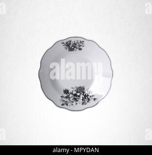 plate or flowers on plate painted by hand on background Stock Photo