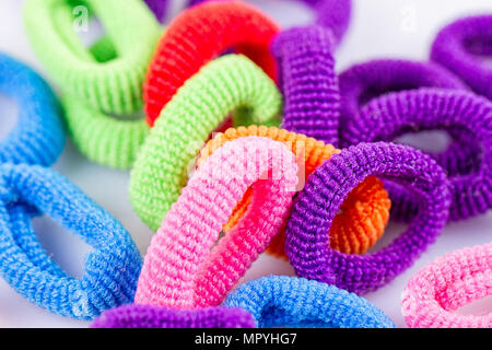 the hair multicolored rubber bands grouped close-up Stock Photo