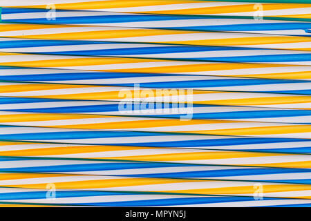 Background stripes multicolored smoothies plastic cocktail straws Stock Photo