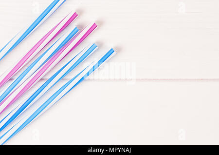 Multicolor cocktail tubes on white background. Close up Stock Photo