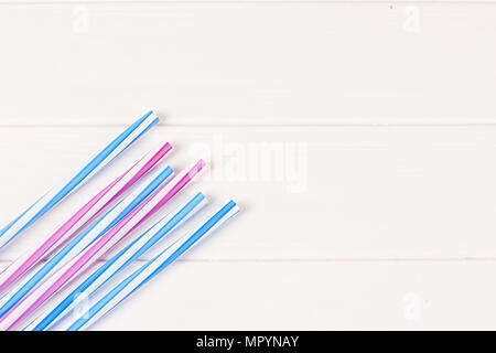Multicolor cocktail tubes on white background. Close up Stock Photo