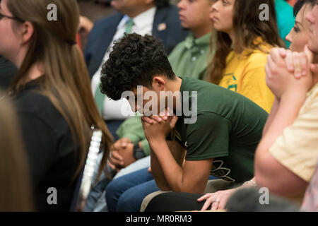 A school shooting survivor listens as Texas Gov. Greg Abbott hosts a Capitol panel studying school safety and student mental health issues in the wake of the March 2018 Santa Fe school shooting that left ten dead. Santa Fe HS students and parents attended the panel. Stock Photo