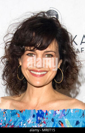 US actress Carla Gugino attends the premiere of the film 'Faster' at