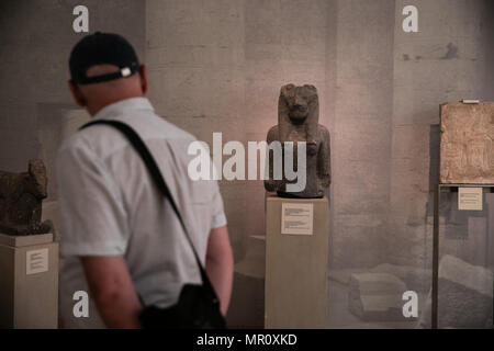 Athens. 23rd May, 2018. Picture taken on May 23, 2018 shows a man visiting the National Archaeological Museum in Athens, Greece. Located in the center of Athens, the National Archaeological Museum houses more than 20,000 exhibits, including the world's finest collection of Greek antiquities. Credit: Lefteris Partsalis/Xinhua/Alamy Live News Stock Photo