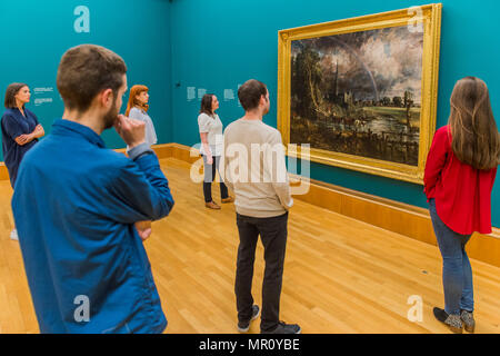 London, UK. 25th May, 2018. Constable’s Salisbury Cathedral from the Meadows 1831 returns to the Tate Britain following its five-year journey across the UK, as part of the Aspire programme. It has been seen by over one million visitors since it began its tour in 2013.The painting is being shown alongside Turner’s Caligula’s Palace and Bridge, also 1831, in a new display, Fire and Water, marking the first pairing of these two works since they were exhibited over 180 years ago. Credit: Guy Bell/Alamy Live News Stock Photo