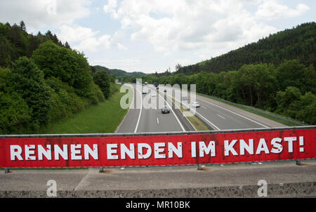 24 May 2018: Germany, Geisingen: A banner, attached to the reiling of a bridge spanning across a motorway, reads 'Todesfahrt' (lit. fatal drive) as part of a campaign against illegal car races on German motorways. Photo: Steffen Schmidt/epa Scanpix Sweden/dpa Stock Photo