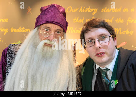 ExCel, London, 25th May 2018. Cosplayers as Harry Potter and Professor Dumbledore. Cosplayers, Comic Characters, Superheros and costumed visitors come together for MCM Comicon's London Opening Day 2018, running at ExCel Exhibition Centre May 25-27th. Credit: Imageplotter News and Sports/Alamy Live News Stock Photo