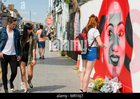 Dublin, Ireland. 25th May 2018. A young woman stands in silent thought at the memorial of Savita Halappanavar during the Irish Abortion Referendum 2018. Ireland are voting to repeal the 8th Amendment to the Irish Constitution.  Credit: Butler Photographic/Alamy Live News Stock Photo