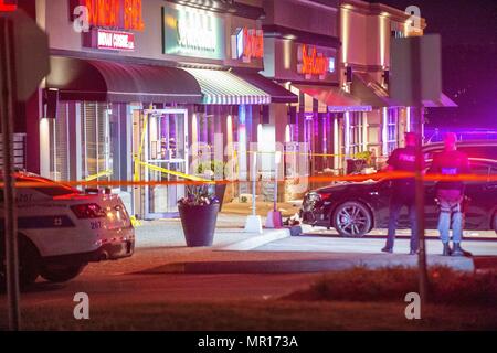 Mississauga, CAN., 24 May 2018. 24th May, 2018. Fifteen people were rushed to hospital, 3 in critical condition, after a bomb exploded in a Mississauga, Canada, Indian Restaurant. The explosion happened around 10:30 PM in the Toronto suburb, west of the city. Police are searching for two suspects. Credit: Victor Biro/ZUMA Wire/Alamy Live News