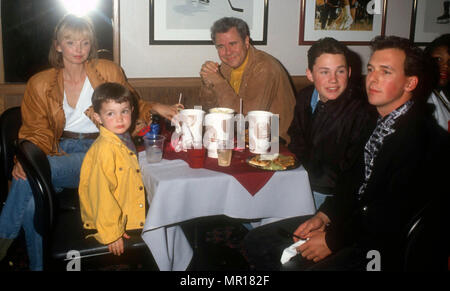 INGLEWOOD, CA - MARCH 6: Elizabeth Larroquette, actor John Larroquette and sons Benjamin Larroquette and Jonathan Larroquette attend the Moscow Circus Opening Night Performance on March 6, 1991 at the Great Western Forum in Inglewood, California. Photo by Barry King/Alamy Stock Photo Stock Photo