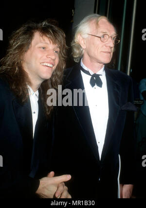 BEVERLY HILLS, CA - MARCH 7: (L-R) Singer Jon Bon Jovi and actor Richard Harris attend the 19th Annual American Film Institute (AFI) Lifetime Achievement Award Salute to Kirk Douglas on March 7, 1991 at Beverly Hilton Hotel in Beverly Hills, California. Photo by Barry KIng/Alamy Stock Photo Stock Photo