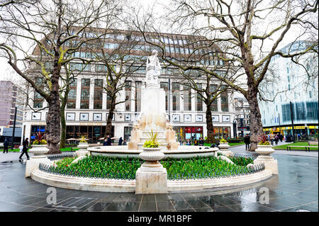 London, UK - April 2018: Statue of William Shakespeare sculpted by Giovanni Fontana, in Leicester Square Gardens in City of Westminster, London Stock Photo