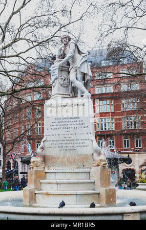 London, UK - April 2018: Statue of William Shakespeare sculpted by Giovanni Fontana, in Leicester Square Gardens in City of Westminster, London Stock Photo