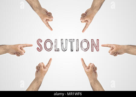 New idea, Solution, resolution concept. Pointing hands around the text Stock Photo