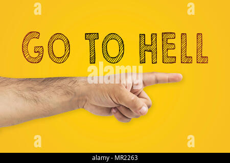 Go to hell concept. Hand showing the way to the hell. Finger pointing the direction to the hell Stock Photo