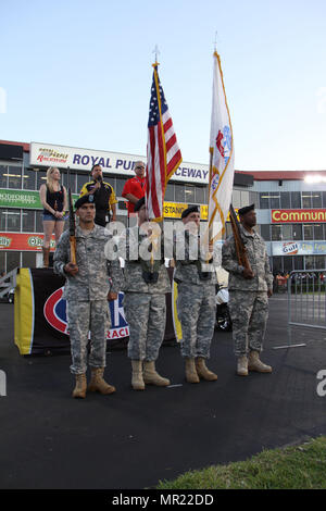 In this image released by the Army Reserve's 75th Training Command, soldiers with the unit's Headquarters Company present U.S. and Army flags at a drag racing event in Baytown, Texas, Friday, April 21, 2017. The event, the National Hod Rod Association's Spring Nationals, featured the participation of several Army organizations as part of the service's ongoing recruiting and community relations effort. The 75th Training Command, the senior military headquarters for Houston and the surrounding region, regularly plays a role in events of a public nature. (Photo/75th Training Command, Army Reserve Stock Photo