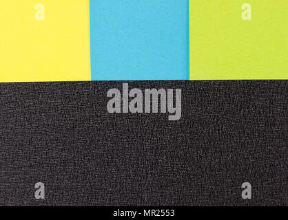 background of colored stickers on the black Stock Photo