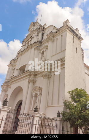 Facade of the catholic church called Parroquia San Luis rey de Francia is located at the Central Park in the small town of San Luis Jilotepeque in the Stock Photo