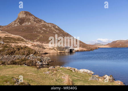 Cregennan Lakes boathouse, Snowdonia, Wales, on a clear, sunny day Stock Photo