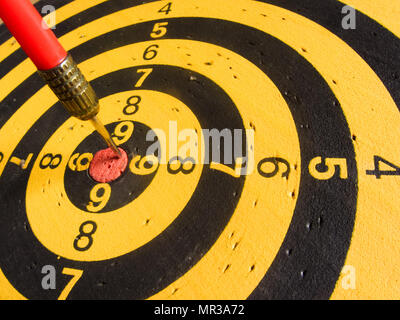 diagonal view of an used dartboard Stock Photo