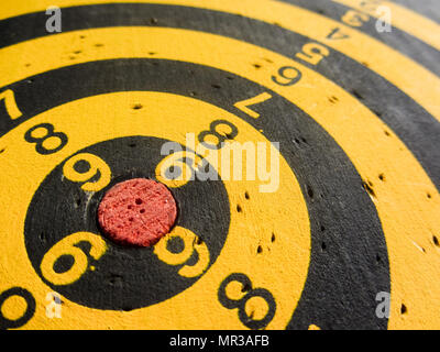 diagonal view of an used dartboard Stock Photo