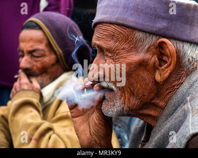 Old man conversation about Corbett at Sanouli Village, where Jim Corbett shot the Panar maneating leopard, Kumaon Hills, Uttarakhand, India Stock Photo