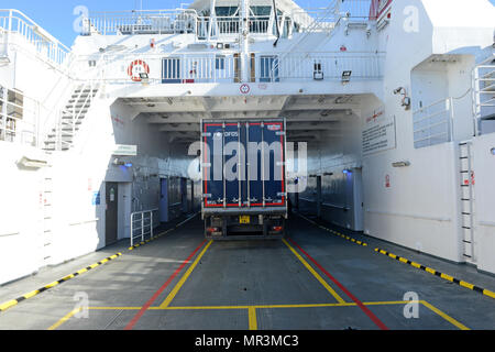 The Yell ferry that connects the mainland of Shetland to the island of Yell. Dropping off passengers and cars to the ferry terminal Stock Photo