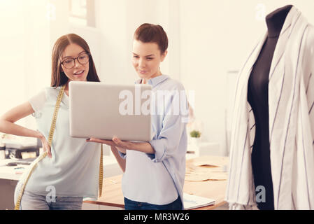 Talented designers using a laptop Stock Photo