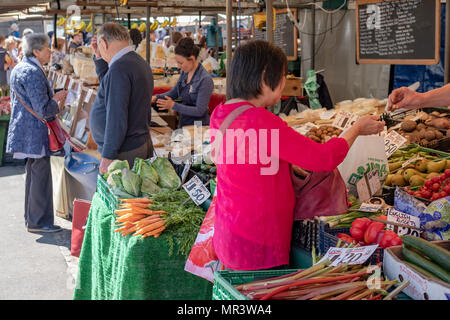 A shopper is seen in the fruit and vegetables section of a supermarket ...