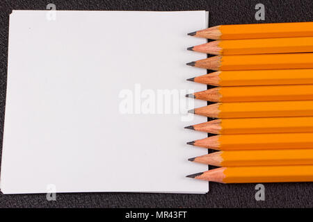 Simple pencils, a blank sheet, a template Stock Photo