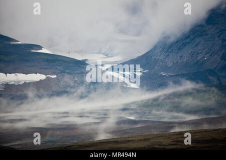 Misty landscape in Dovrefjell National Park, Dovre, Norway. Stock Photo
