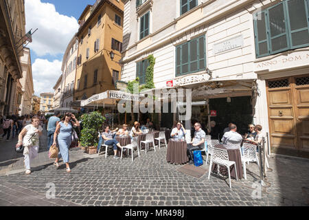Rome Italy, Bar restaurant, people tourists sitting terrace in the street. Stock Photo
