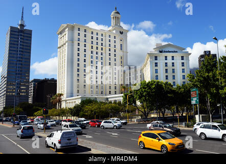 Traffic on Walter Sisulu Avenue by the Southern Sun waterfront complex in Cape Town. Stock Photo